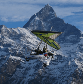 Ultralight aircraft flying near the Annapurna range